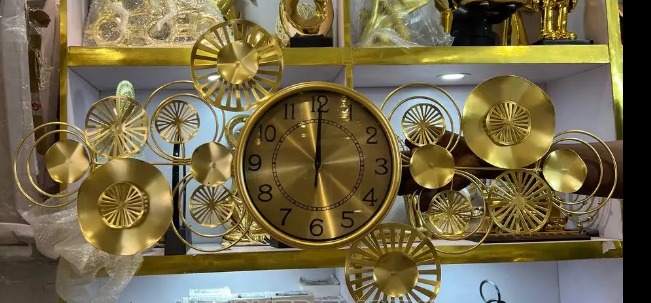 Large gold wall clock