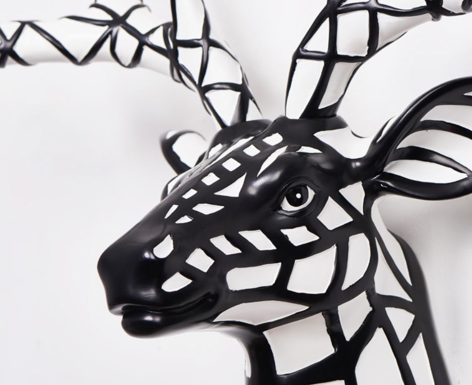 details of embellished deer head wall sculpture