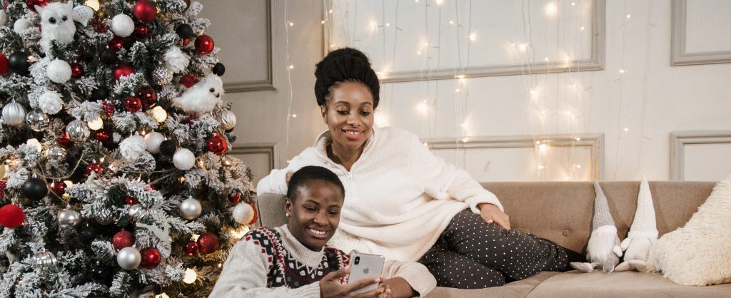 Nigerian women decorating for Christmas